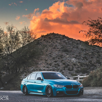 Blue Stanced BMW 3-Series with Aftermarket Headlights - Photo by Avant Garde Wheels