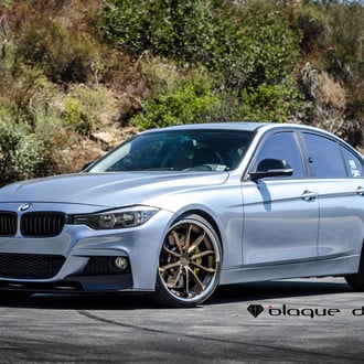 Gray BMW 3-Series with Custom Projector Headlights - Photo by Blaque Diamond