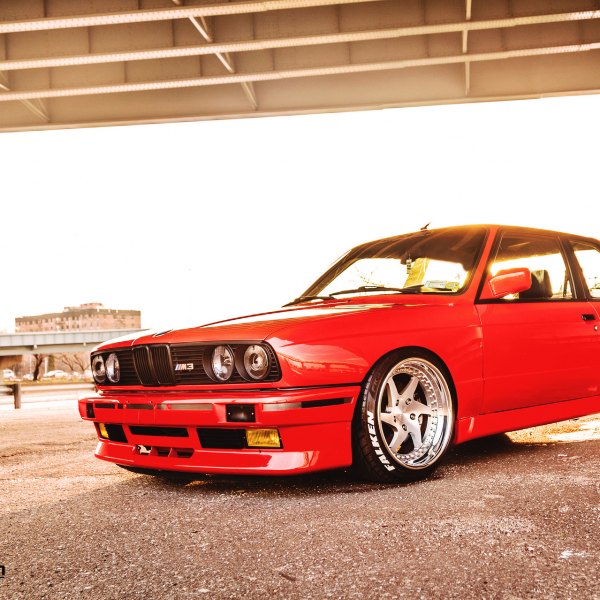 Custom Front Bumper on Red BMW 3-Series - Photo by Rennen International