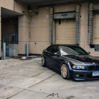 Carbon Fiber Hood on Blue BMW 3-Series - Photo by Arlen Liverman