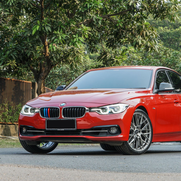 Front Bumper with Fog Lights on Red BMW 3-Series - Photo by Vorstiner