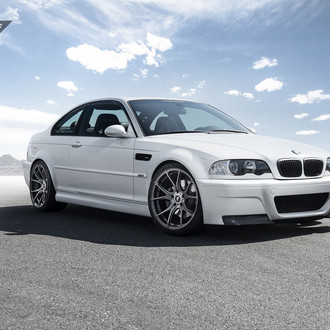 Carbon Fiber Front Bumper Lips on White BMW 3-Series - Photo by Vorstiner