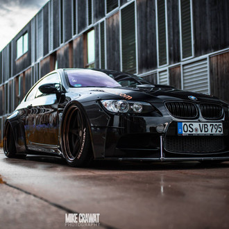 Menacing Black M3 With a Body Kit and Rear Window Louvers - Photo by Vossen