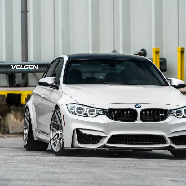 Carbon Fiber Front Lip on White BMW 3-Series - Photo by Velgen