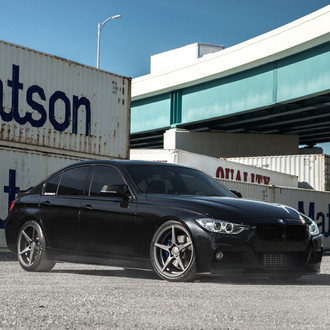 Front Bumper with Fog Lights on Black BMW 3-Series - Photo by Velgen