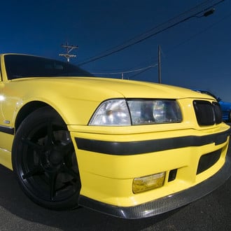 Carbon Fiber Front Lip on Yellow BMW 3-Series - Photo by dan kinzie