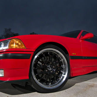 Red BMW 3-Series with Custom Front Lip - Photo by dan kinzie