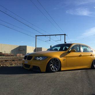 Custom Halo Headlights on Yellow BMW 3-Series - Photo by JR Wheels