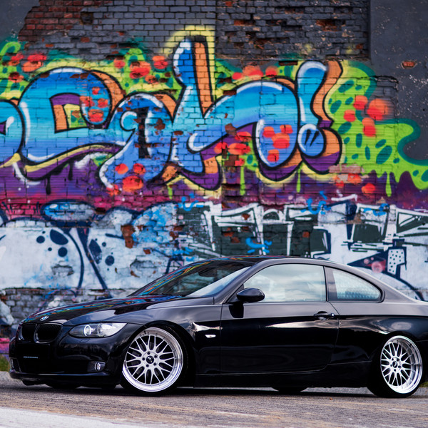 Front Bumper with Fog Lights on Black BMW 3-Series - Photo by JR Wheels