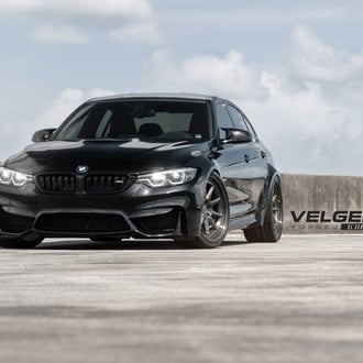 Crystal Clear Halo Headlights on Black BMW 3-Series - Photo by Velgen Wheels