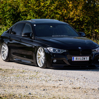 Stanced Black BMW 3-Series on Custom Wheels - Photo by Vossen