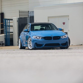 Blue BMW 3-Series with Aftermarket Halo Headlights - Photo by Vossen