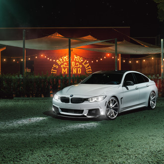 White BMW 4-Series with Carbon Fiber Front Lip - Photo by Vossen