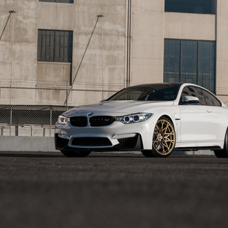 White BMW 4-Series Standing Out on Bronze Vorsteiner Wheels