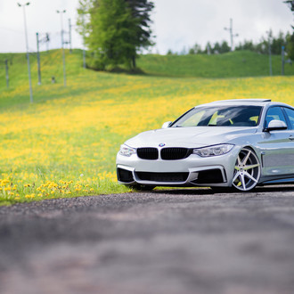 Gray BMW 4-Series with Custom Headlights - Photo by JR Wheels