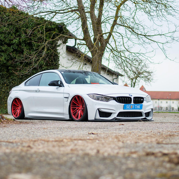 Custom Lowered White BMW 4-Series on Red Vossen Wheels - Photo by Vossen