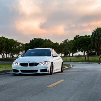 White BMW 4-Series Sport with Custom Halo Headlights - Photo by Vossen