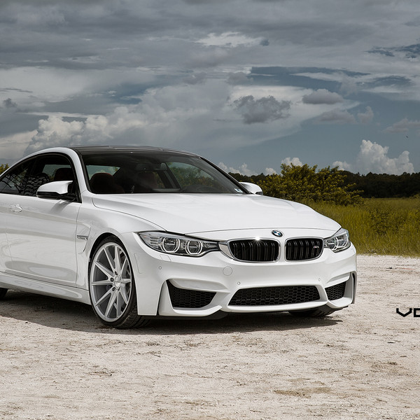 Aftermarket LED Headlights with Halo Rings on White BMW 4-Series - Photo by Vossen