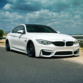 White BMW M4 with Custom Halo Headlights - Photo by Rotiform