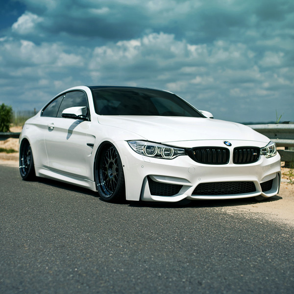 White BMW M4 with Custom Halo Headlights - Photo by Rotiform