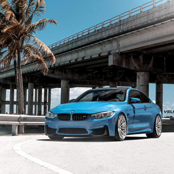 Blue BMW M4 with Aftermarket Front Bumper - Photo by Velgen