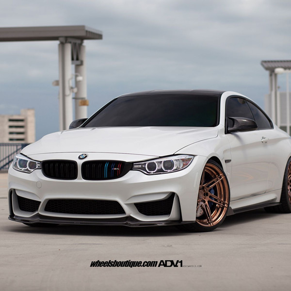 White BMW M4 with Halo Headlights - Photo by ADV.1