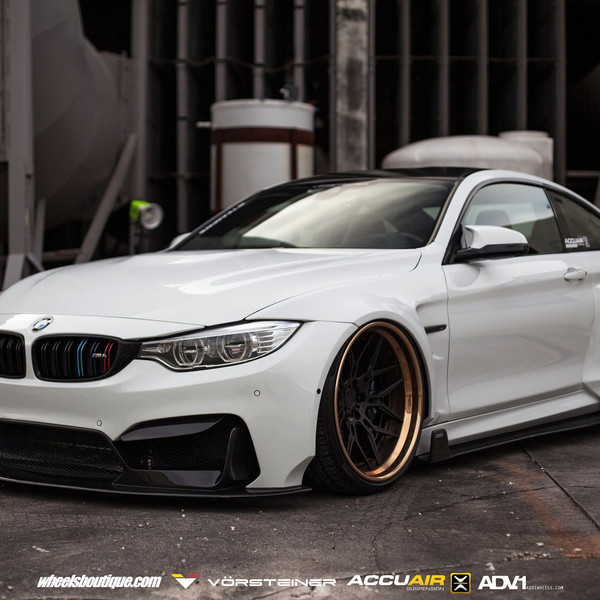 White Stanced BMW M4 with Custom Front Bumper - Photo by ADV.1