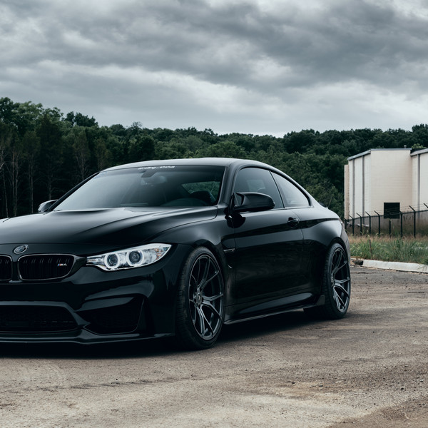 Black BMW 4-Series with Custom Halo Headlights - Photo by Arlen Liverman