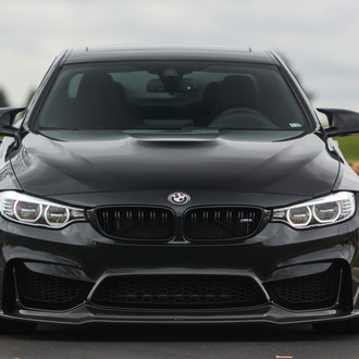 Black BMW 4-Series with Crystal Clear Headlights - Photo by Vorstiner
