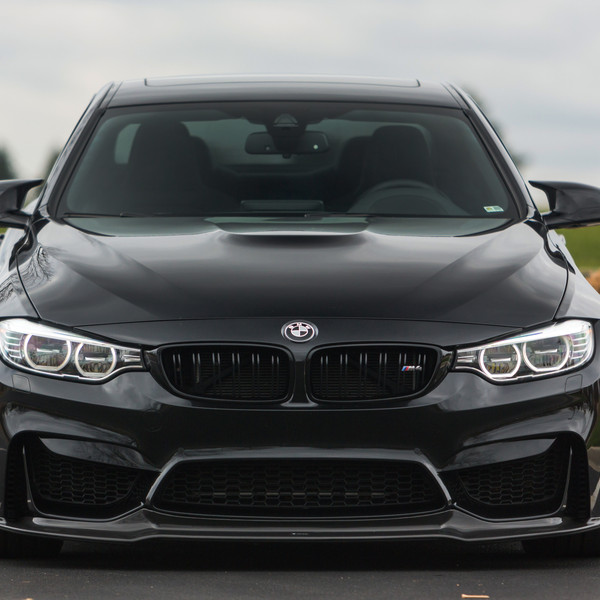 Black BMW 4-Series with Crystal Clear Headlights - Photo by Vorstiner