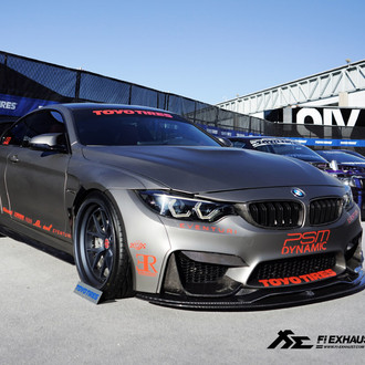 Aftermarket Halo Headlights on Yellow BMW 4-Series - Photo by Fi exhaust