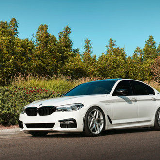 Custom Front Bumper on White BMW 5-Series - Photo by Avant Garde Wheels