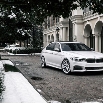 Front Bumper with LED Lights on White BMW 5-Series - Photo by Forgiato