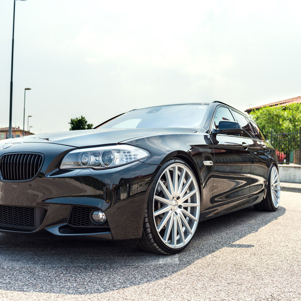 Black BMW 5-Series with Aftermarket Front Bumper Cover - Photo by Vossen