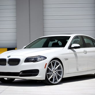 White BMW 5-Series with Custom Front Bumper - Photo by Vossen