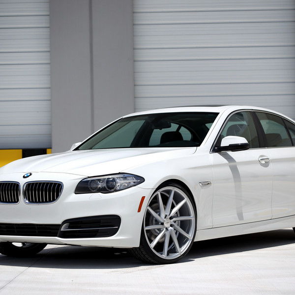 White BMW 5-Series with Custom Front Bumper - Photo by Vossen