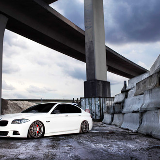 White BMW 5-Series with Aftermarket Front Bumper - Photo by Vossen
