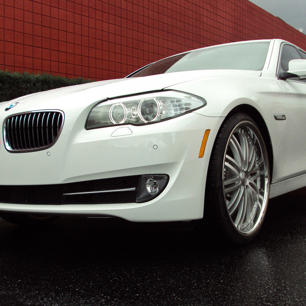 White BMW 5-Series on Chrome Vossen Wheels - Photo by Vossen