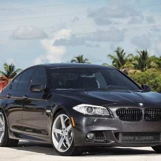 Aftermarket Crystal Clear Headlights on Black BMW 5-Series - Photo by Vossen