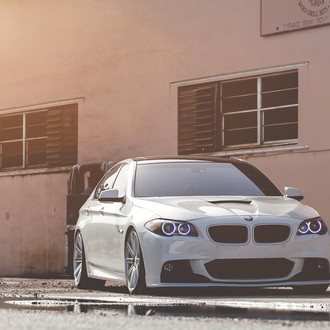 Headlights with Color Halo on White BMW 5-Series - Photo by Vossen