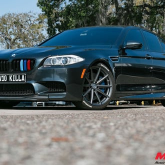 Black BMW 5-Series with Carbon Fiber Front Lip - Photo by Vossen
