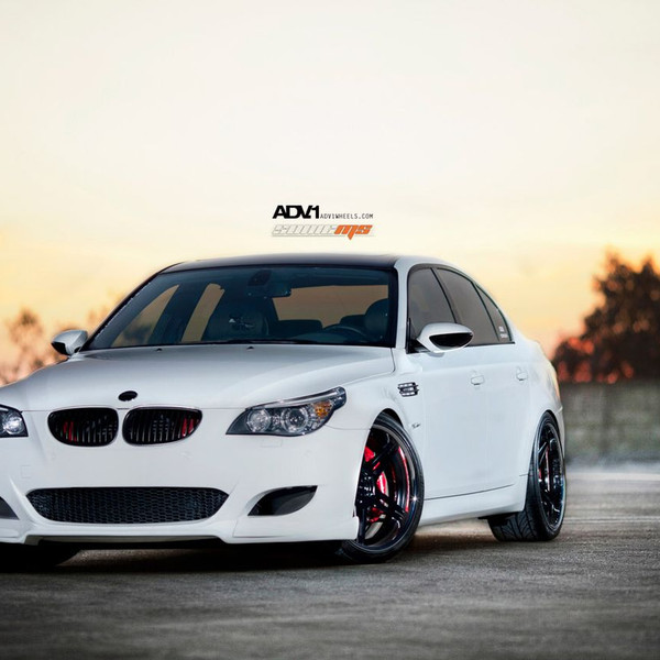White BMW M5 with Aftermarket Front Bumper - Photo by ADV.1