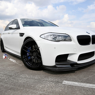 Gripping M5 on Black ADV1 Rims Boasting Carbon Fiber Ground Effects