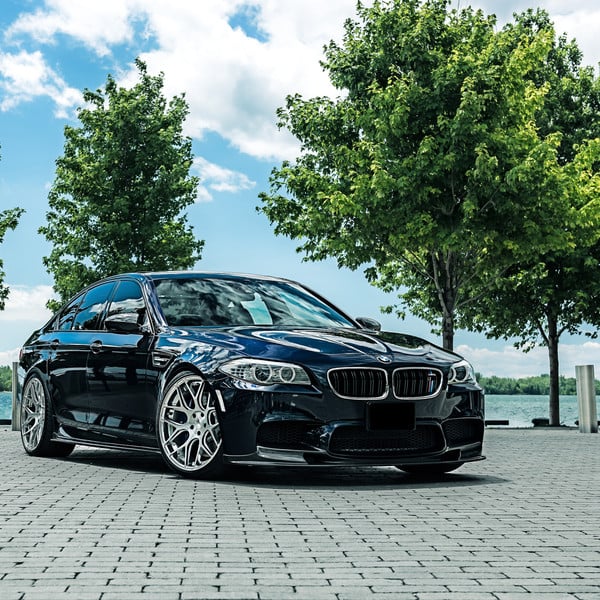 Gloss Black BMW 5-Series with Halo Headlights - Photo by Avant Garde Wheels