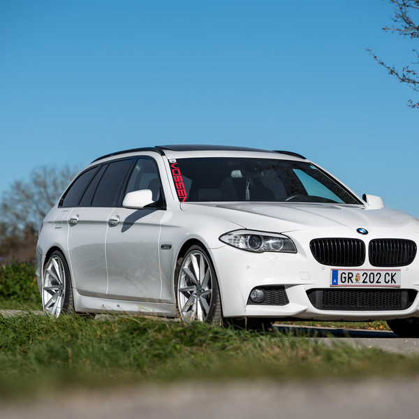 White BMW 5-Series with Aftermarket Front Bumper - Photo by Vossen