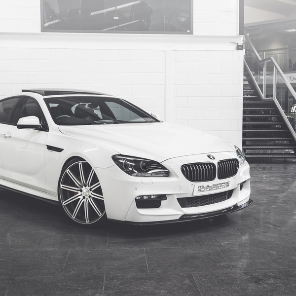 White BMW 6-Series with Custom Black Front Lip - Photo by Vossen
