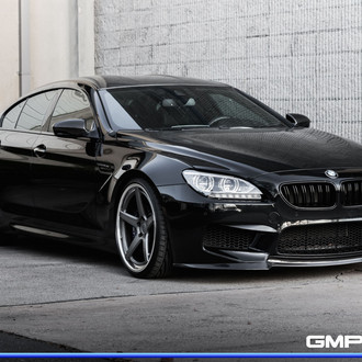 Carbon Fiber Front Lip on Black BMW 6-Series - Photo by Forgeline Motorsports