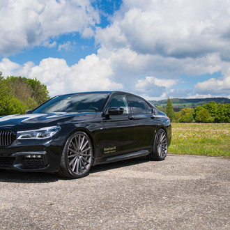 Lowered Black BMW 7-Series with Custom Bumper Grille - Photo by Vossen
