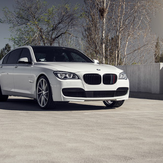 White BMW 7-Series with Custom Black Front Bumper Cover - Photo by Vossen
