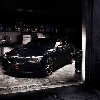 Black BMW 7-Series with DRL Headlights - Photo by Vossen